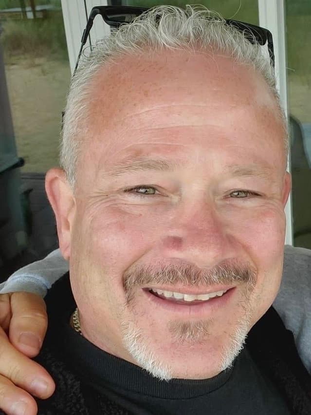 Jim Garrity, the owner of Window Fantasies.