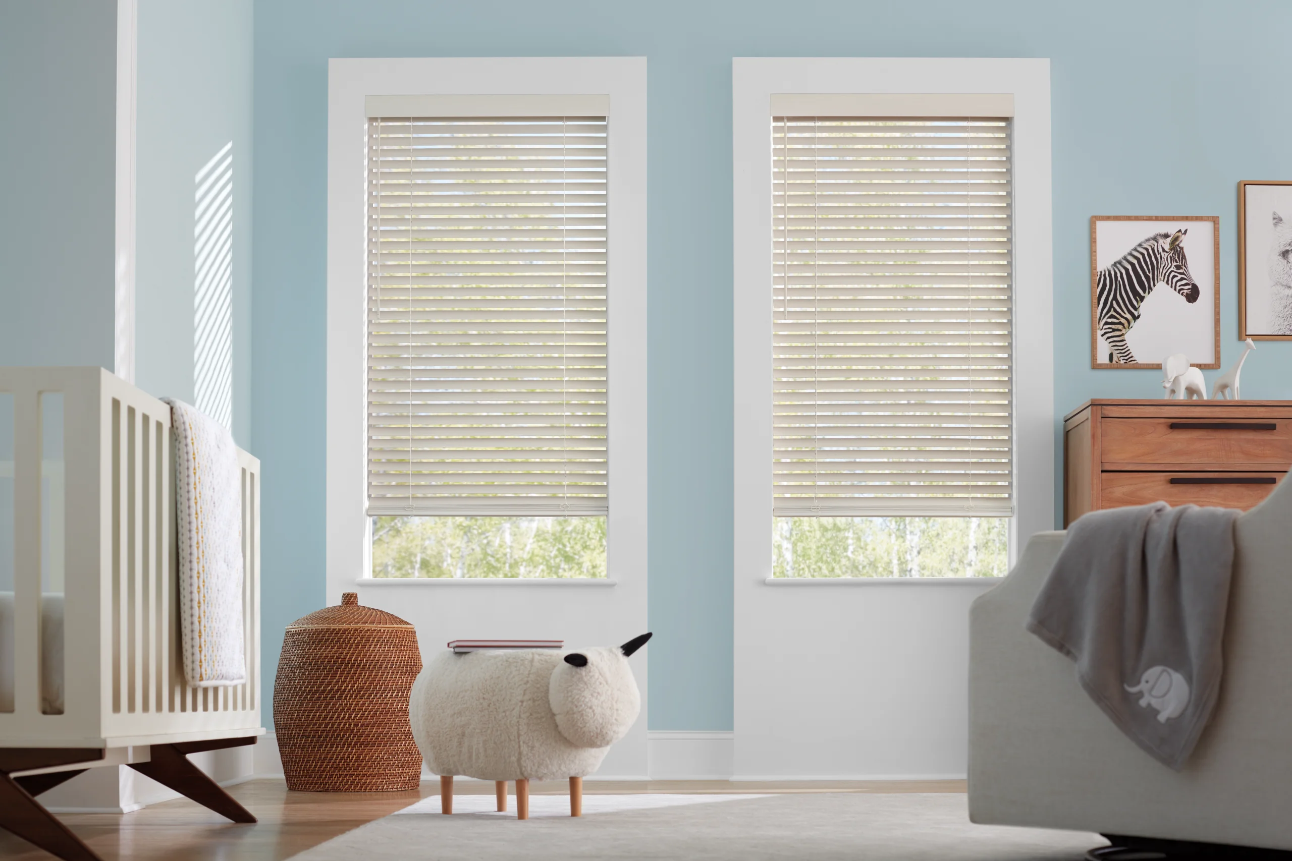 Warm wood blinds installed over a fireplace, the kind of Hunter Douglas product Jim services and repairs.