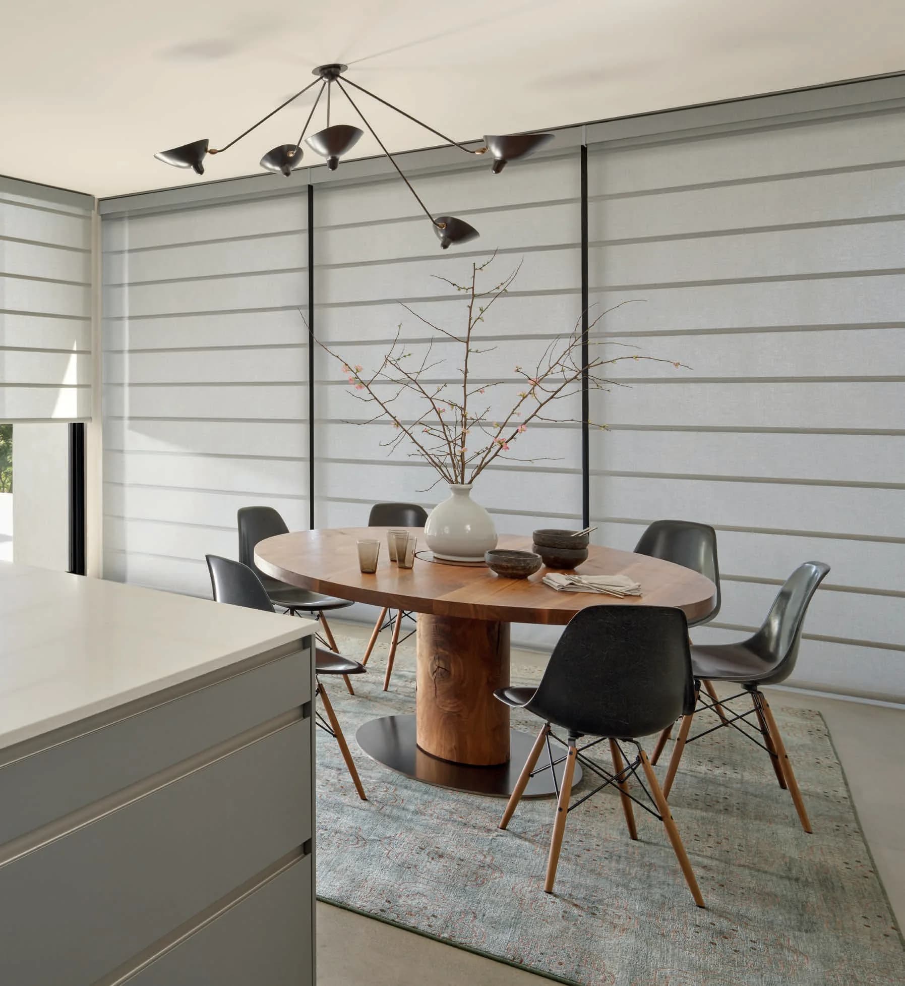 Alustra® Architectural Roller Shades in Hunter Douglas's Finley fabric, color Misty Harbor, operated with PowerView® Automation.