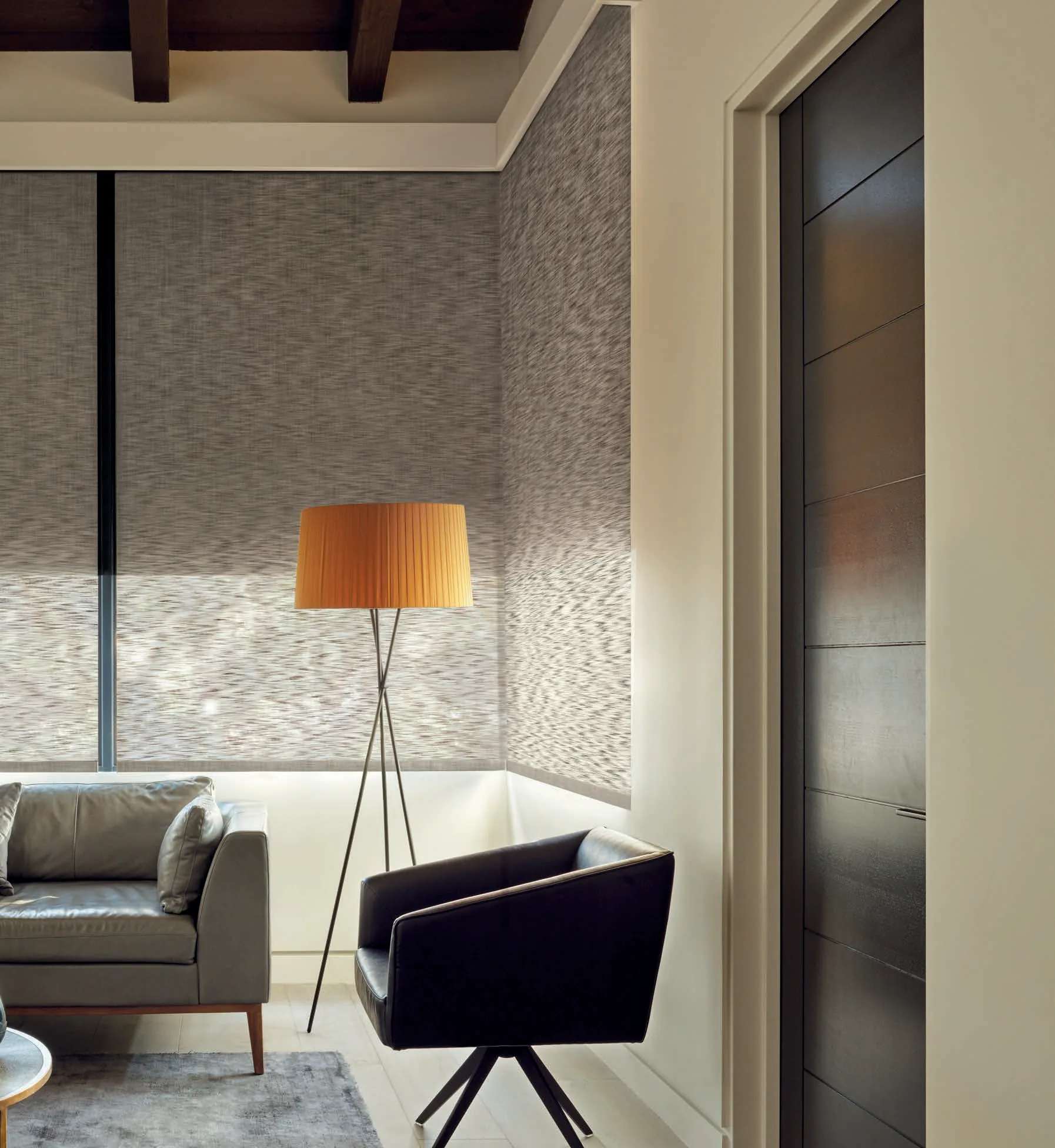 An Alustra® Woven Textures® Dual Roller Shade in Hunter Douglas's Retreat fabric, color Cabana, operated with PowerView® Automation.