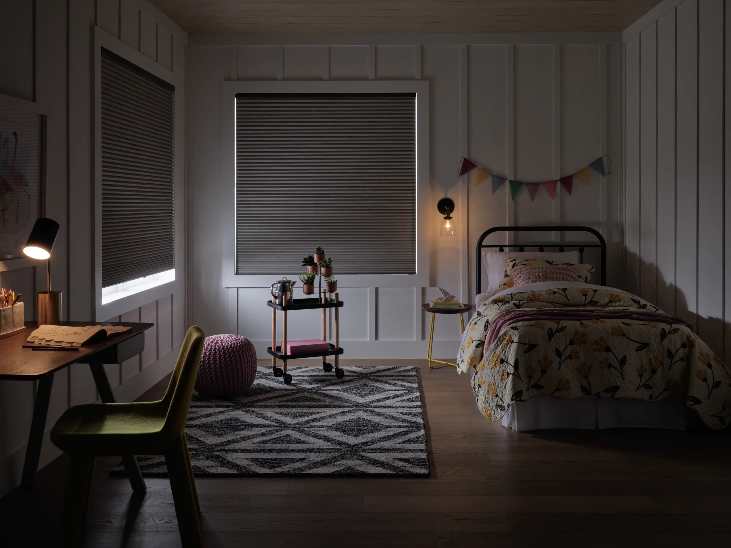 Hunter Douglas Applause® Honeycomb Shades in a room-darkening fabric closed across a nursery window.
