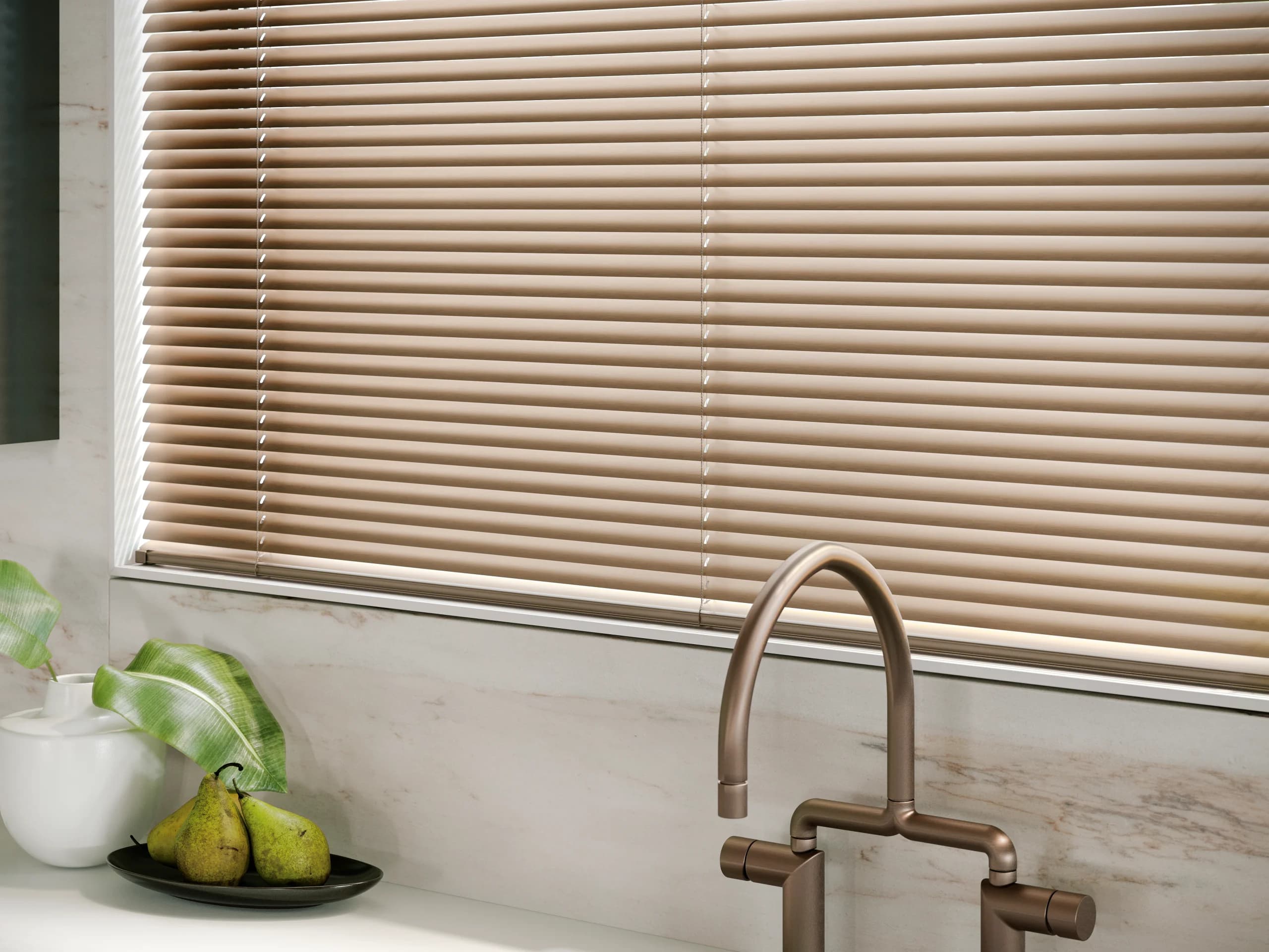 Hunter Douglas Metal Blinds from the Décor collection, inside mounted on a kitchen window.