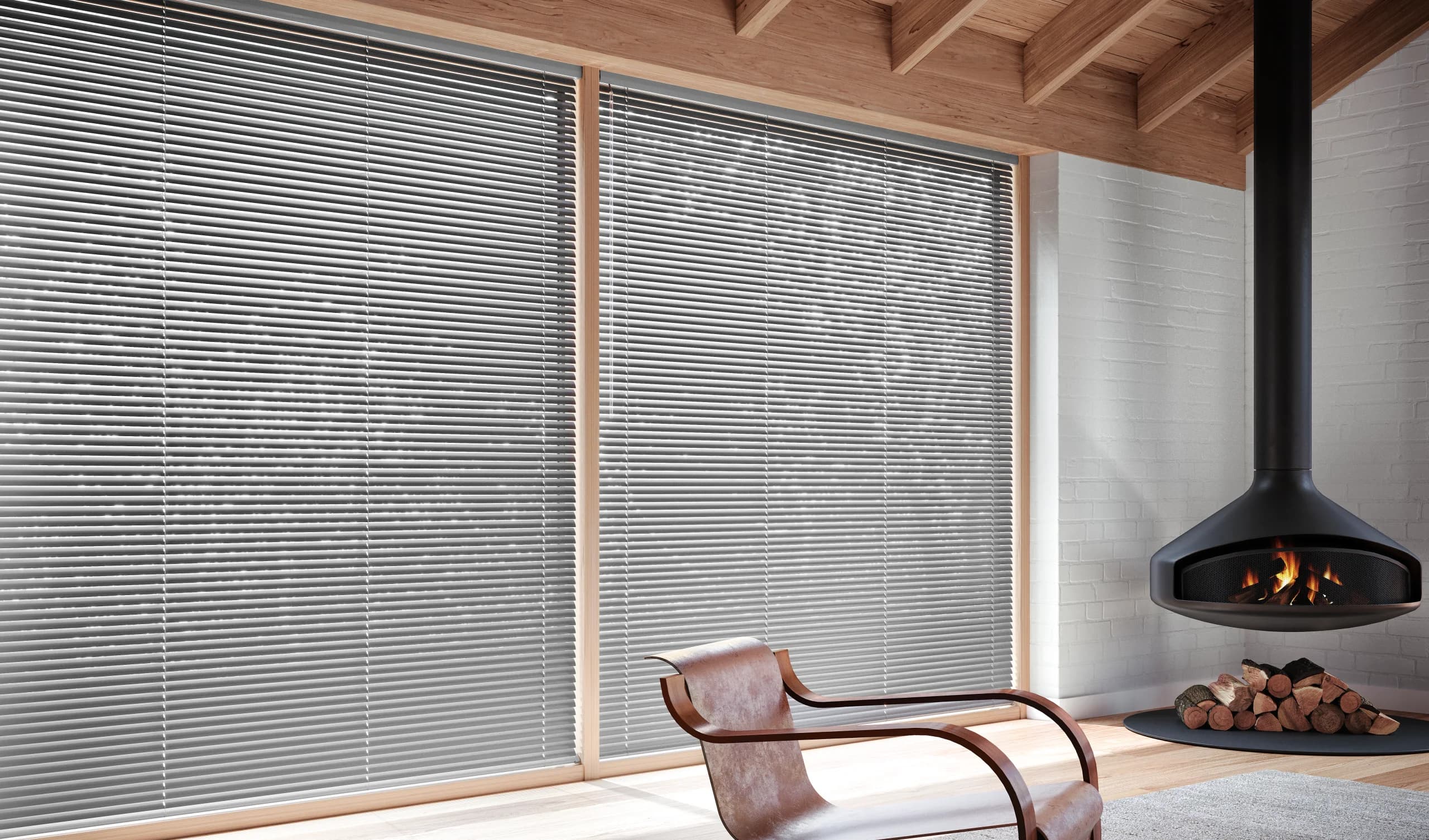 Hunter Douglas Modern Precious Metals® Aluminum Blinds in black across a living room window.