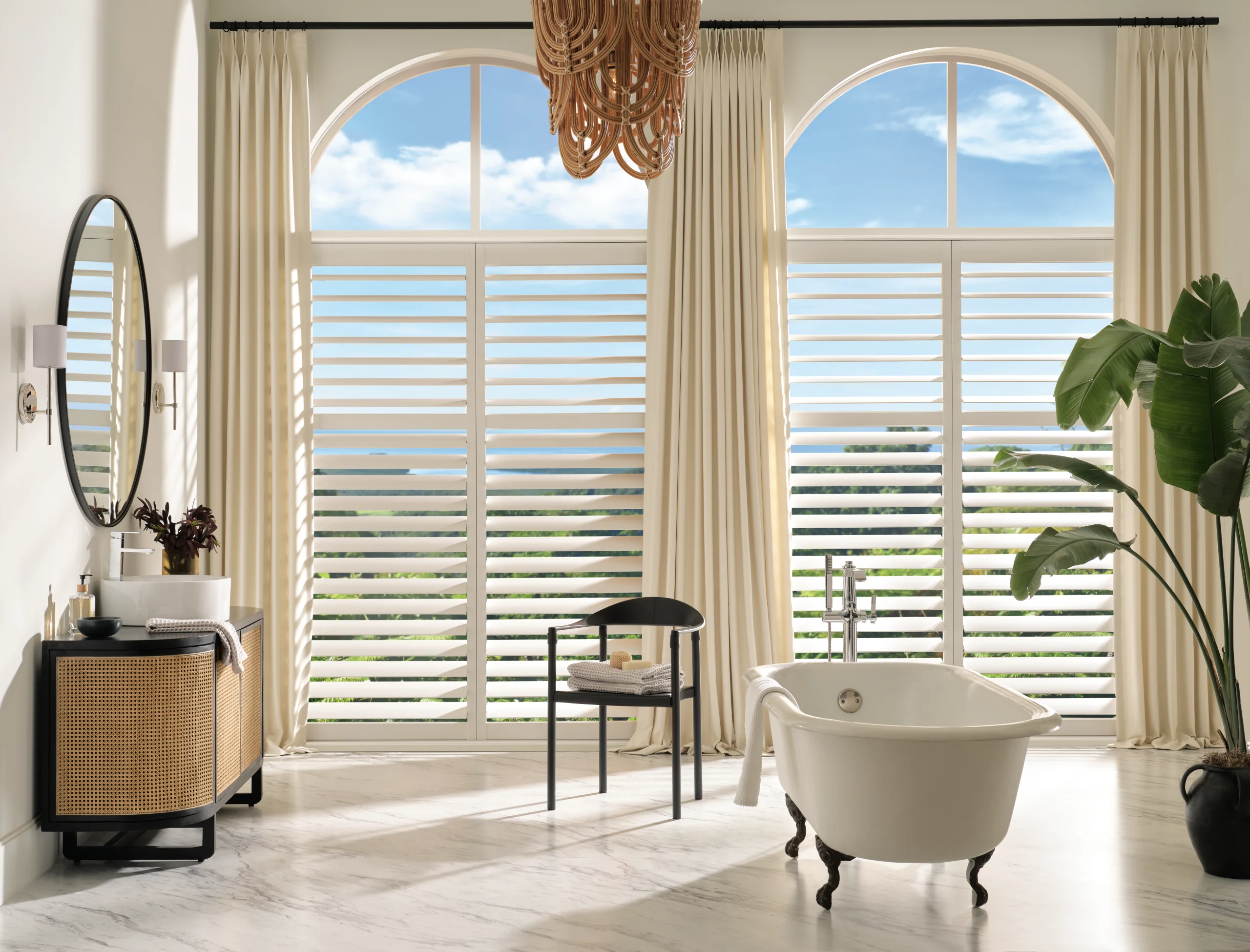 Hunter Douglas Palm Beach™ Polysatin™ Shutters on a bathroom window, the room where moisture is hardest on a treatment.