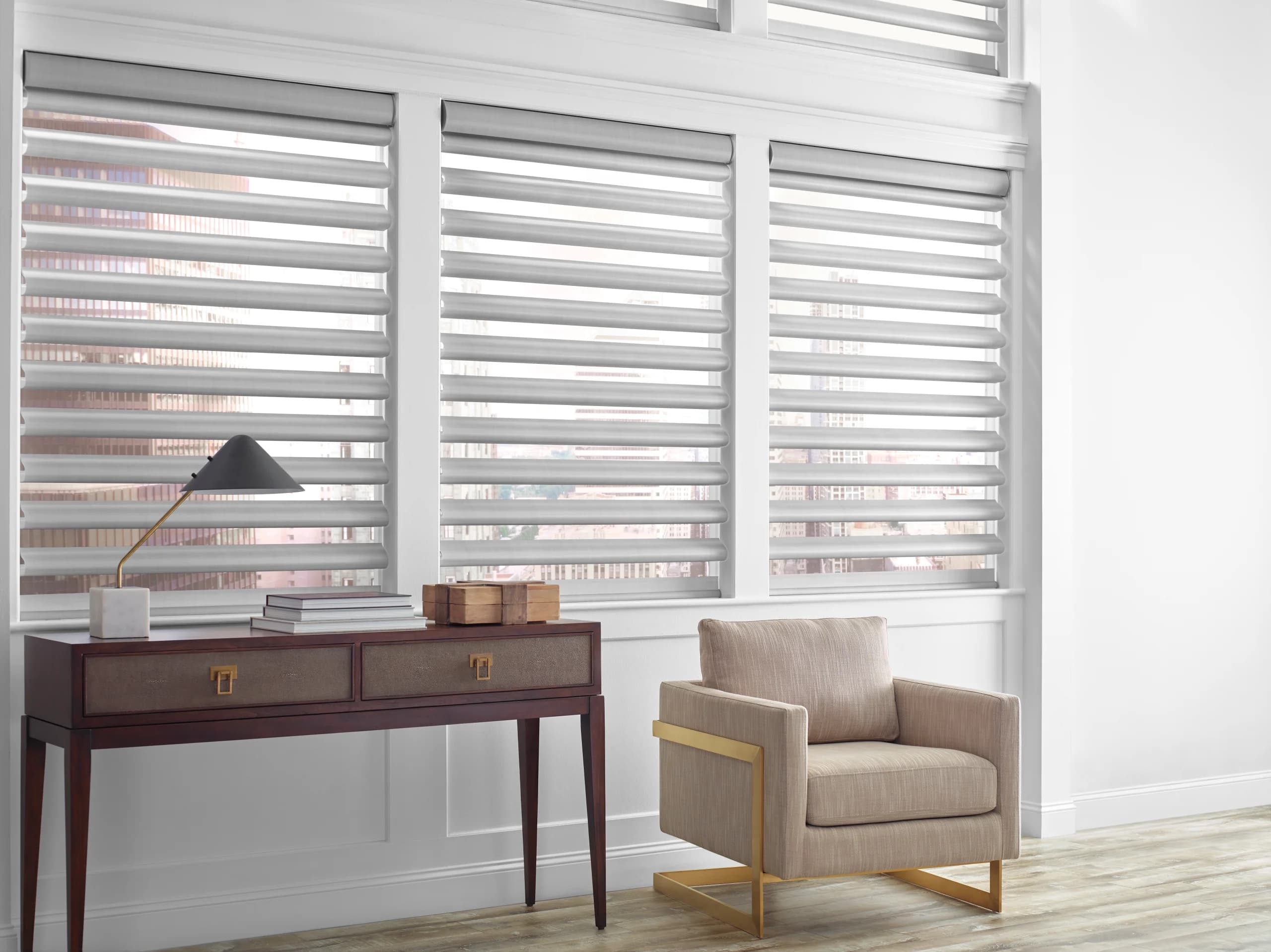 Hunter Douglas Pirouette® Window Shadings with the vanes open in a bright entryway.