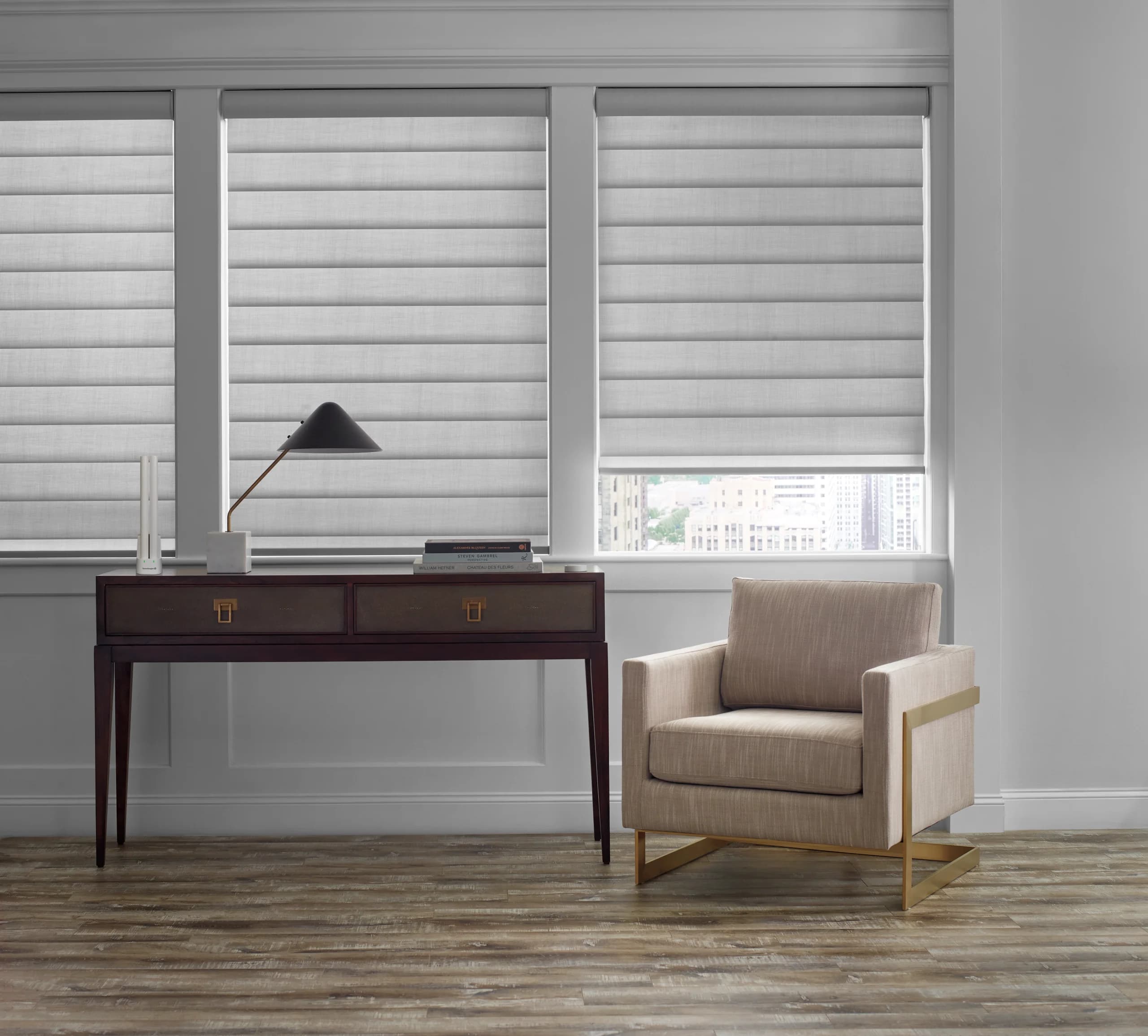 Hunter Douglas Pirouette® Window Shadings closed across an entryway window for privacy at the front of the house.
