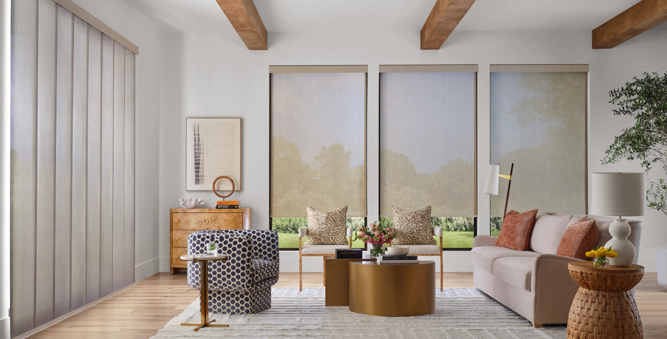 Skyline® Gliding Window Panels in a Wisp 5 percent openness fabric across a living-room slider.