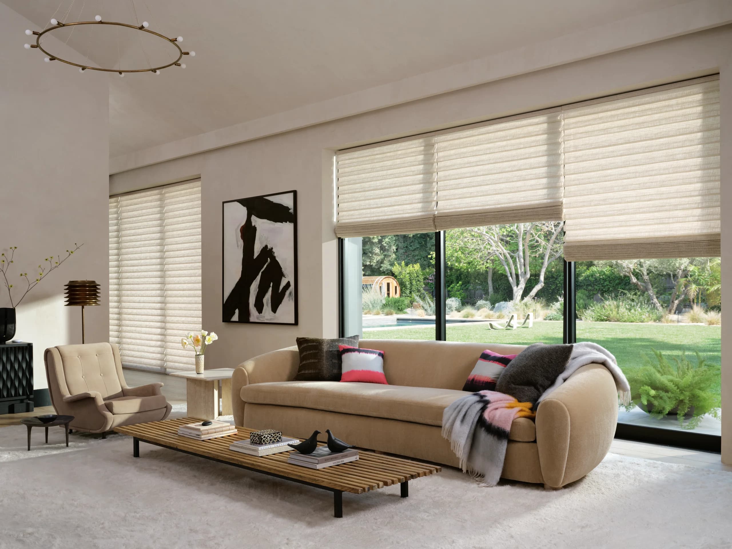 Tailored Hunter Douglas Vignette® Modern Roman Shades in a refined living room with a grand piano.