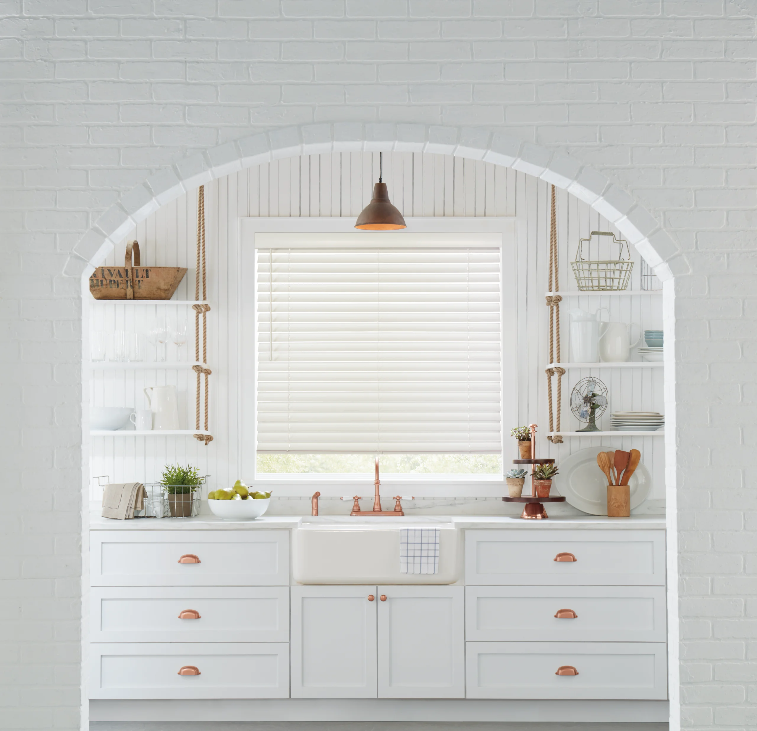 Custom Hunter Douglas Parkland® Wood Blinds with cloth tapes in a warm home library, measured and installed by Window Fantasies.