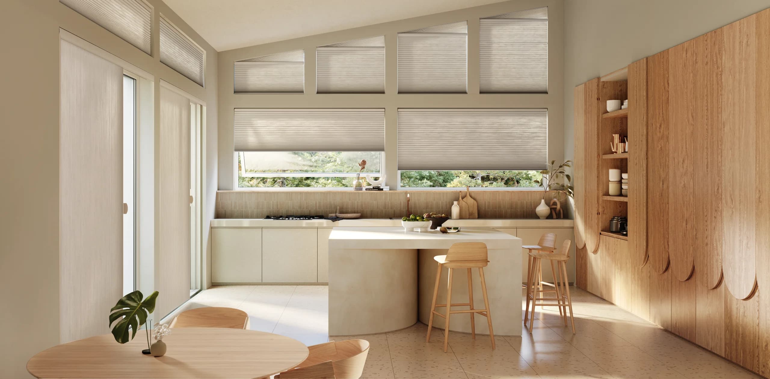 Open Hunter Douglas fabric sample books and wood stain chips on a sunlit kitchen table.