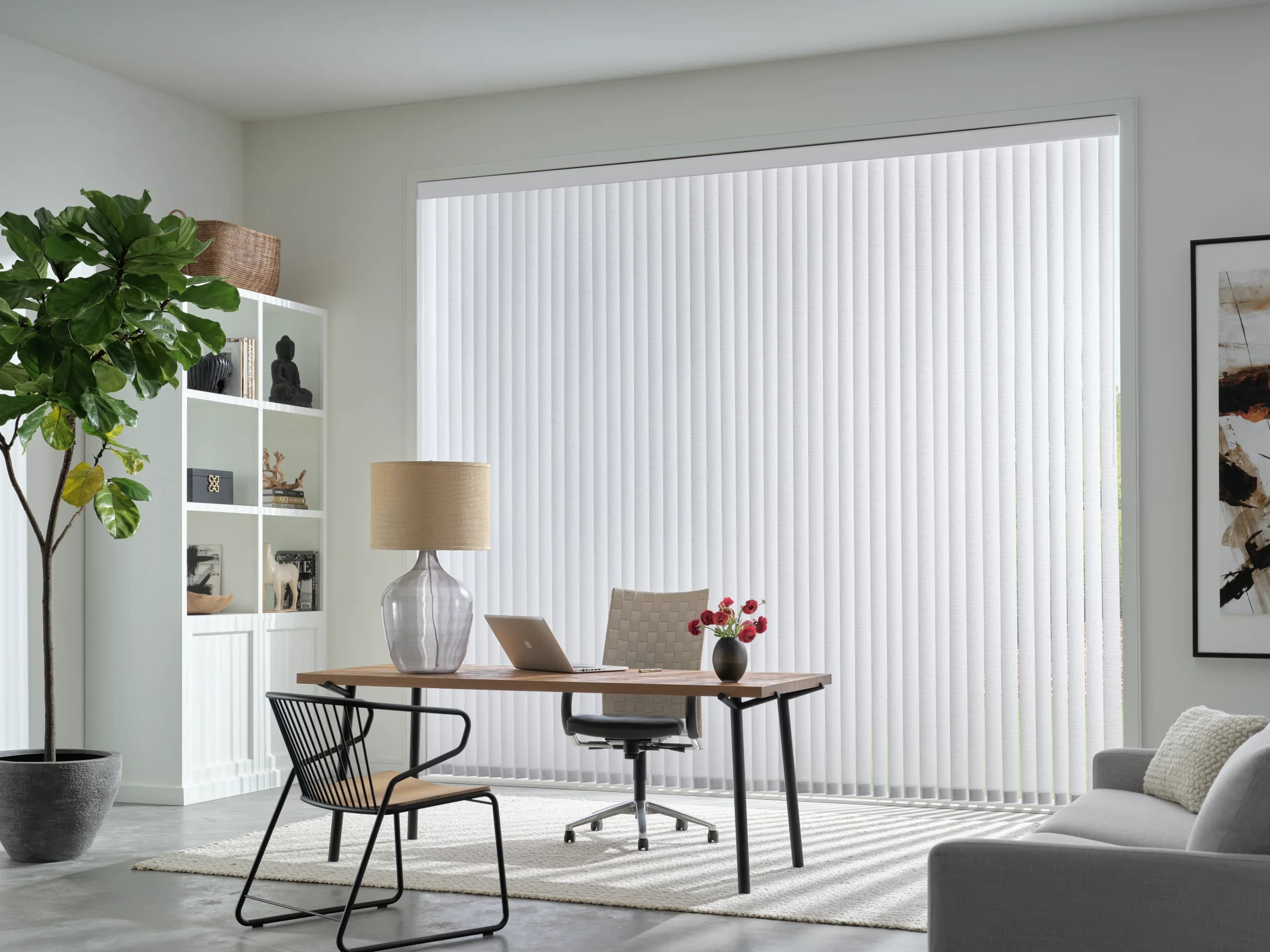 Plantation shutters framing French doors with an ocean view.