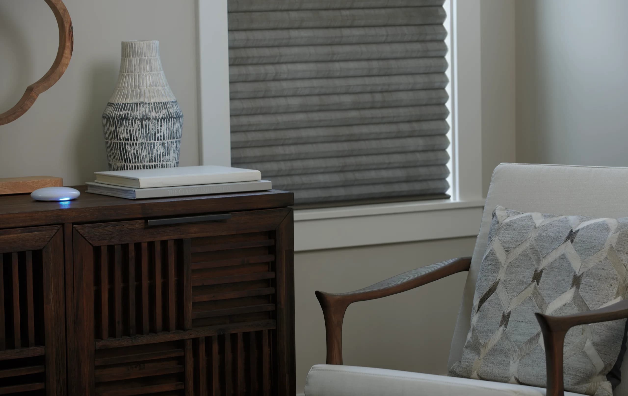 Hunter Douglas shades running on PowerView® Automation in a New England home, installed and configured by Window Fantasies.