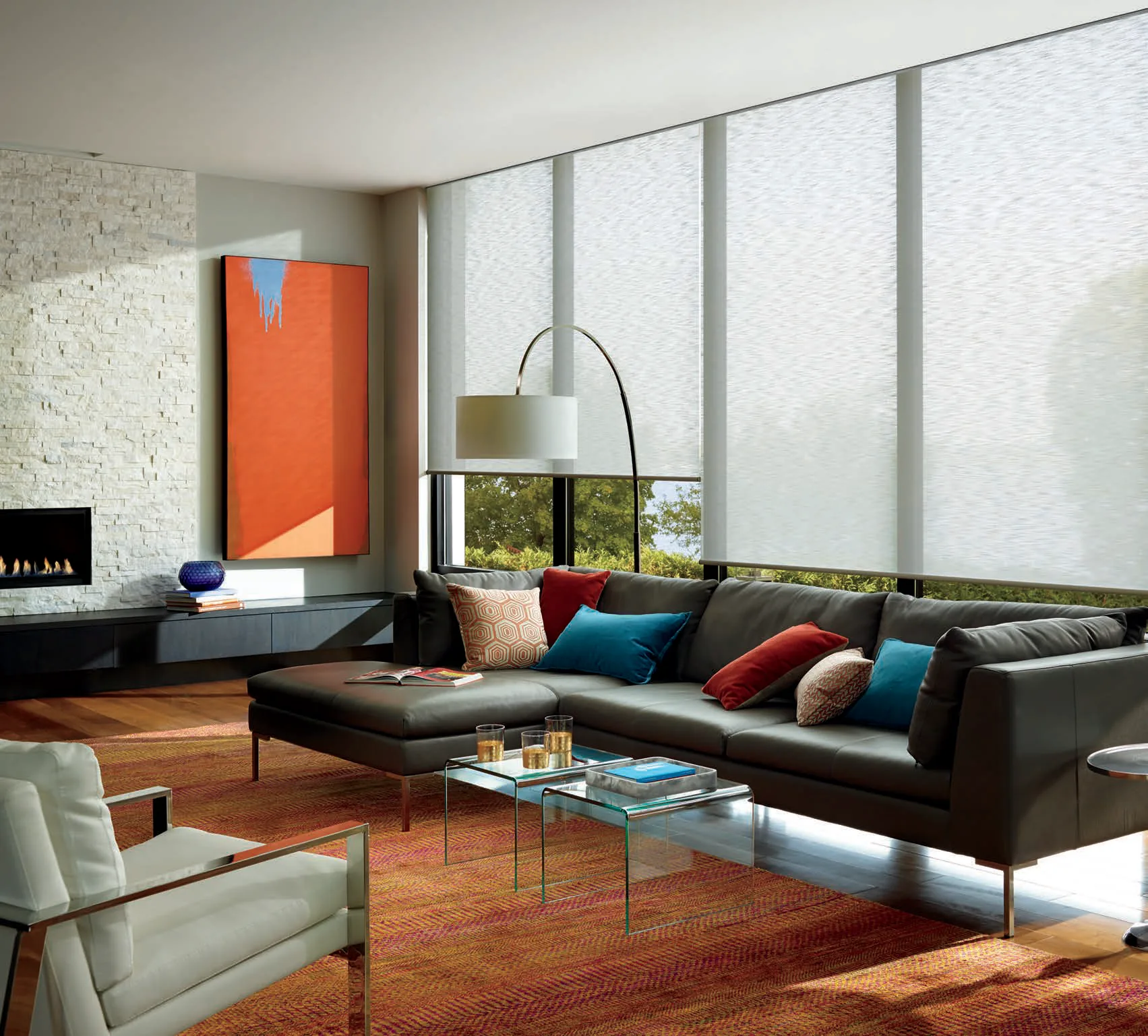 Alustra® Woven Textures® Roller Shades in Hunter Douglas's Retreat fabric, color Pure, operated with PowerView® Automation.
