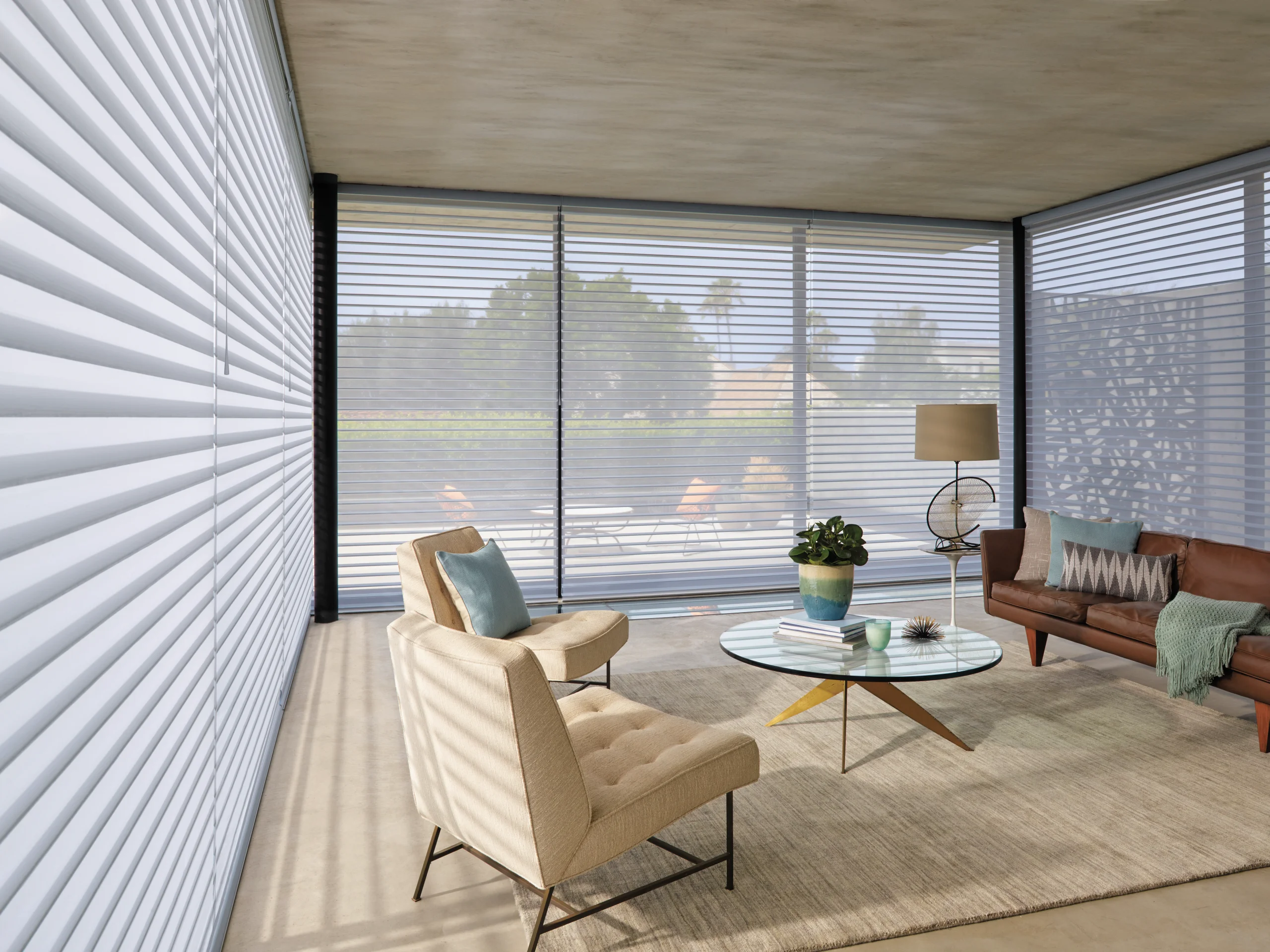 Hunter Douglas Nantucket™ Window Shadings filtering daylight across a living room window.